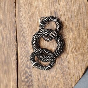 Celtic snake knot mesh pendant